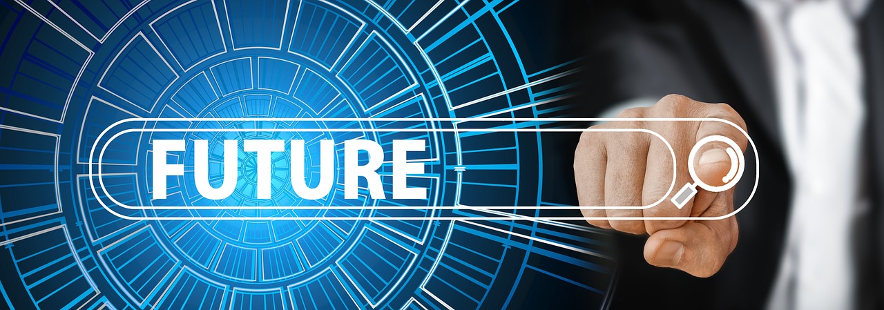 A hand reaching toward the word future